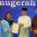 Istri Bupati Langkat Terima Anugerah Tun Fatimah pada Konvensyen Dunia Melayu Dunia Islam